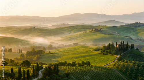 Rolling Green Hills and Vineyards in Tuscany at Sunrise