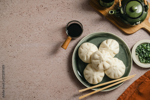 Overhead view of delicious steamed bao buns, copy space