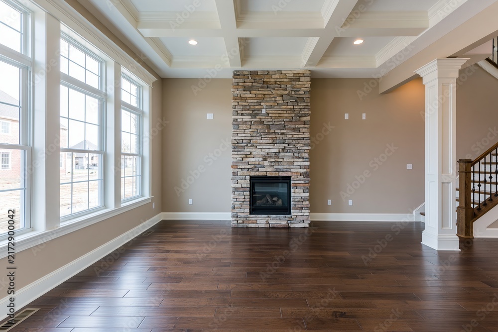 Obraz premium The Stone Fireplace Focal Point in a Bright Spacious Living Room