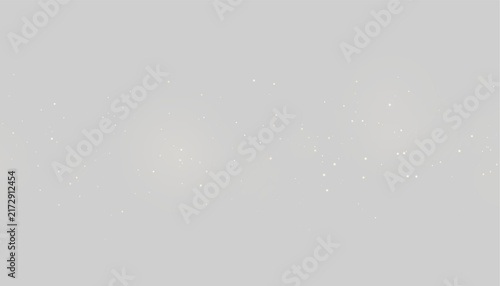 Scattered tiny golden particles glowing softly against a black background with faint circular halos on transparent background