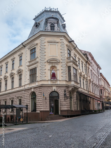 Building in Chernivtsi, Ukraine with a unique architectural style on a quiet street
