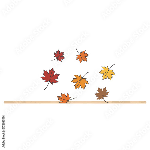 Falling maple leaves on a wooden path, autumn season