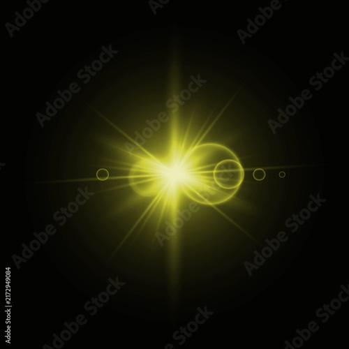 A vibrant glowing yellow light effect with lens flare and radial burst on a dark background