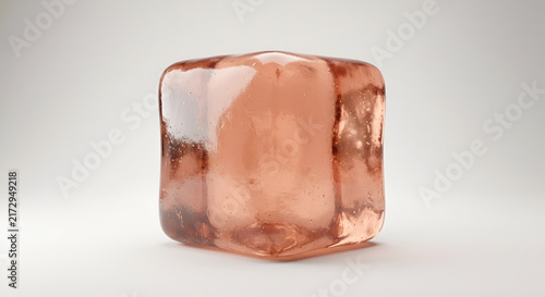 Rose gold translucent ice cube with glossy texture on white studio background.
