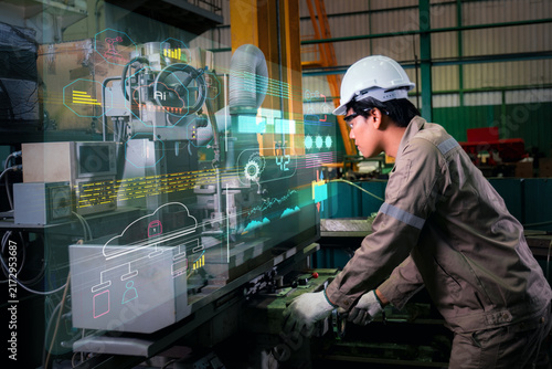Engineers and workers work in the factory.