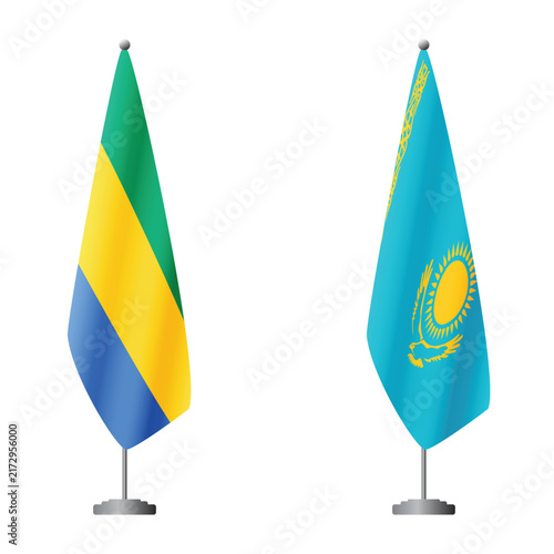 Bild auf Leinwand Gabon and Kazakhstan flags on flagpoles for official ceremonies and meetings, tr