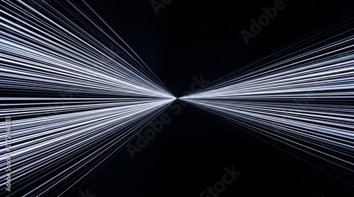 Abstract long-exposure style image of streaming light trails moving through darkness, thin parallel lines of white and pale blue converging toward a vanishing point