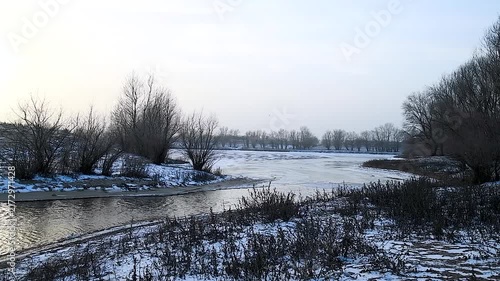 The river in the winter at sunset