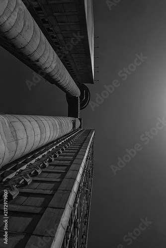 BELGRADE, SERBIA - AUGUST 24, 2026: Low angle view of the famous Genex Tower, a classic brutalist concrete skyscraper under a clear sky in New Belgrade.