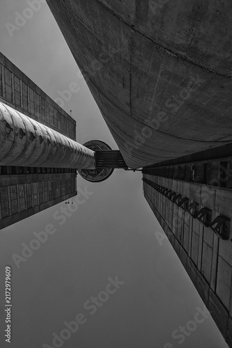 BELGRADE, SERBIA - AUGUST 24, 2026: Low angle view of the famous Genex Tower, a classic brutalist concrete skyscraper under a clear sky in New Belgrade.