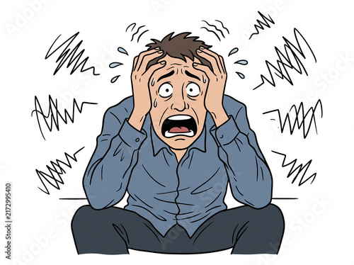 Man experiences intense stress and panic with his hands gripping his head tightly.