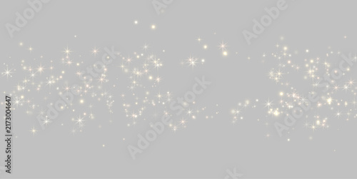 Obraz na płótnie A horizontal shower of star-shaped light bursts sparkles against a dark backdrop