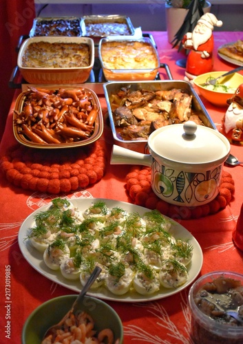 December 24, 2025, Sweden. A traditional festive family Christmas dinner in Sweden.