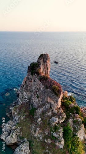 Aerial revealing view of Paralia Fieroulas island in Corfu Greece
