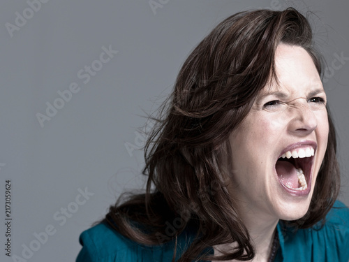 Woman screaming, portrait, close-up