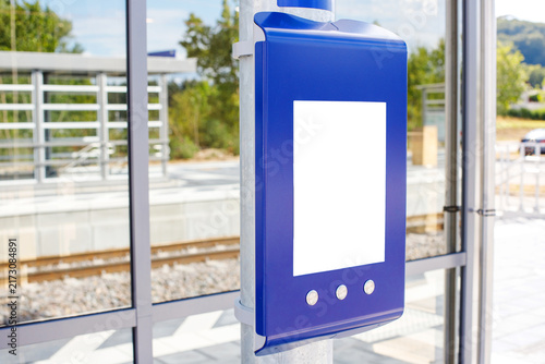 Blue Information Terminal with Blank Screen Mockup at Train Station