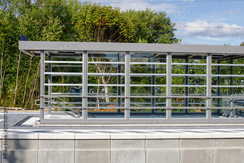 Glass Passenger Waiting Shelter at Railway Station Platform