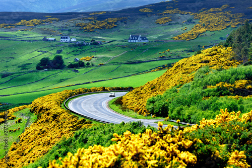 фотографія A9 main trunk road climbs 2 miles north of Helmsdale, Sutherland on Scotlands N