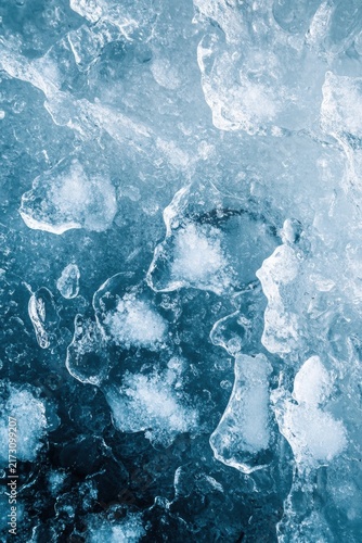 Close-up of textured blue and white ice formations