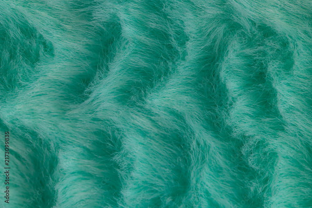 Obraz premium Macro close up of turquoise green faux fur texture background