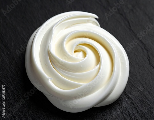 Cream Rose Swirl on Slate Background, Glossy White Dessert Texture