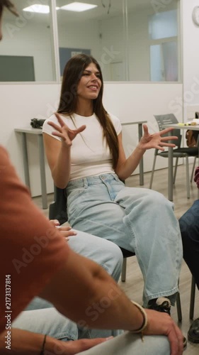 Young woman sharing her story in group therapy session