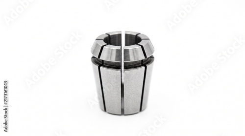Spring steel CNC ER collet expansion slit. Macro photography of radial compression slots and ground finish. Precision tool holding metalworking hardware isolated on pure white background.