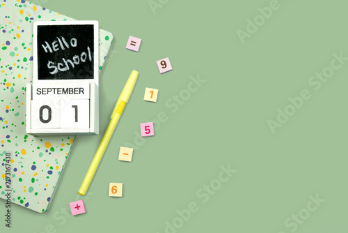 Foto Back to school concept with September 1 calendar, notebook and stationery