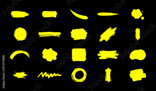 Yellow color brush stroke collection isolated on black background for design elements