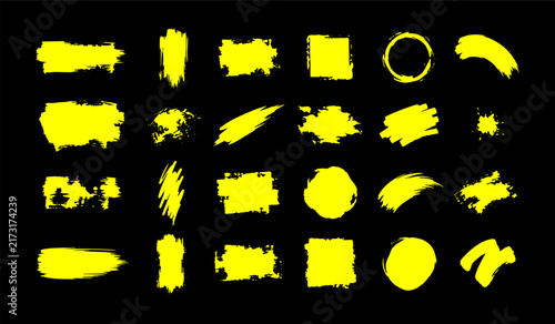 Yellow creative brush stroke collection isolated on black for graphic design elements