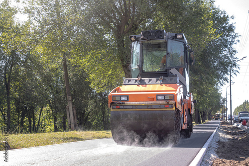 Konstfotografi Road Roller Machine Steam Steaming Fresh Hot Asphalt Surface