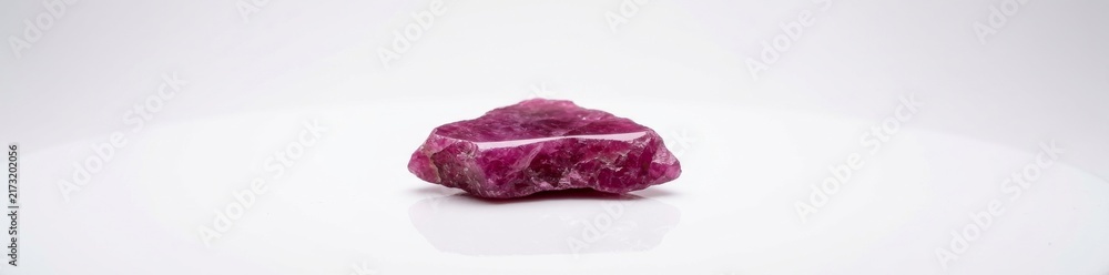 Obraz premium Raw Pink Gemstone Mineral Specimen Isolated on White Background