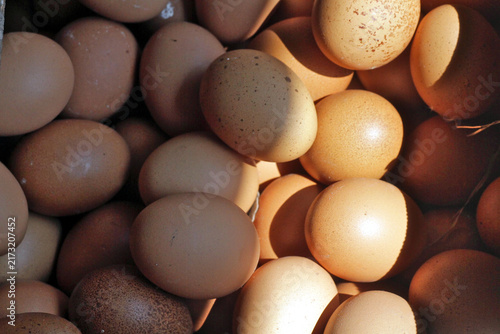 Fresh Brown Eggs Piled in a Farm Basket