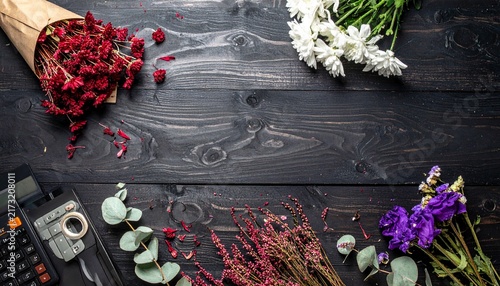Floral workspace with tools and petals