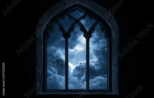 Obraz na płótnie Gothic-style window with a stormy nite sky view