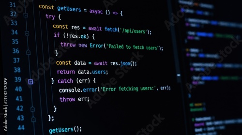 JavaScript code snippet demonstrating an asynchronous function to fetch user data from an API with error handling.