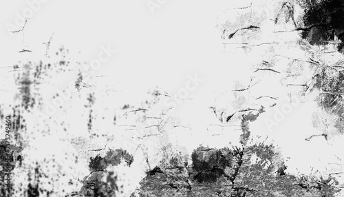 Abstract grunge black background featuring a vintage ink splat design with a rough textured paint border and dirty splatter elements