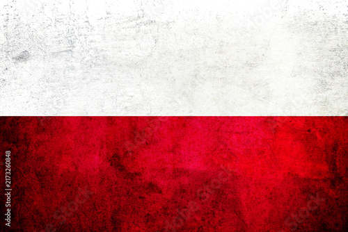 POLAND Flag Grunge Background. National flag of POLAND Grunge on rough metal texture with distressed surface, weathered effect, grain, scratches and aged details. Patriotic background for design.