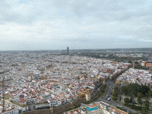 Fotografía Drone aerial of Seville, Spain, showing the blend of medieval architecture and m