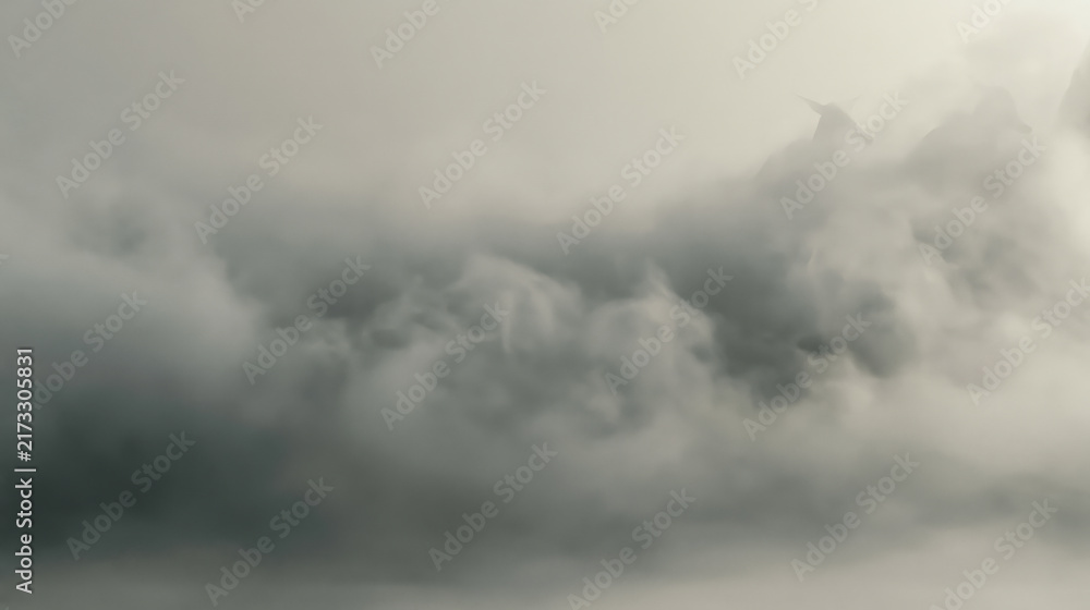 Obraz premium Dark storm clouds gather ominously in the sky, hinting at an impending weather event AI generative