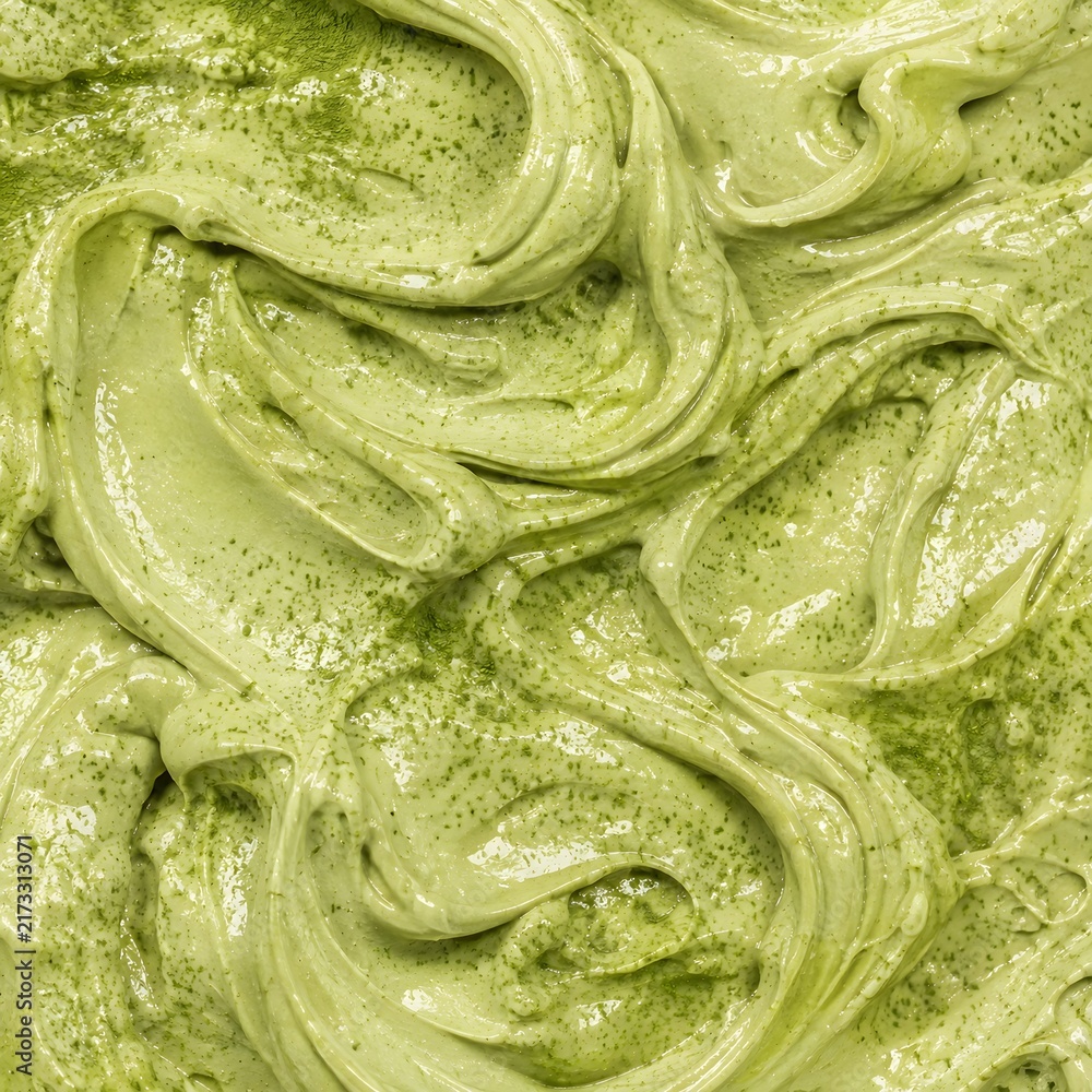 Fototapeta premium Matcha Green Tea Creamy Texture with Swirls, Close Up Food Background