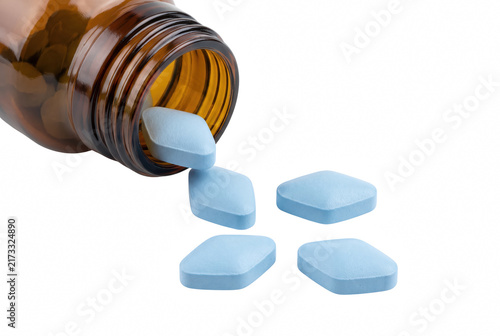 Foto Blue Diamond Shaped Pills Spilling from a Brown Glass Bottle