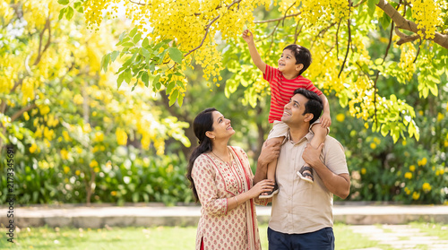 happy indian family enjoying together at park