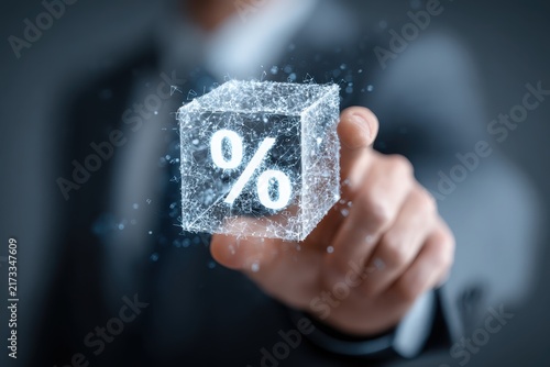 Businessman holding a glowing digital neon percentage cube icon in his hands. Blurred office suit background. Concept of financial interest rate, investment return, banking loan, and tax discount
