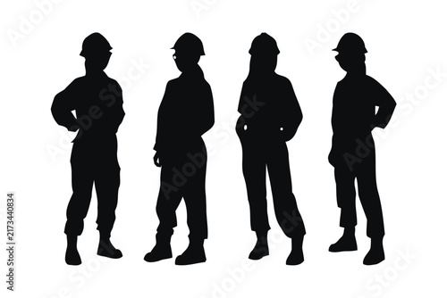 Four black silhouettes of female construction workers wearing hardhats and protective coveralls, standing in a row, isolated on a plain white background