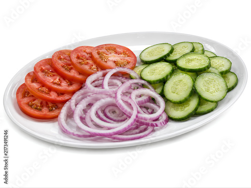 Fresh Tomato, Cucumber and Red Onion Slices on White Plate