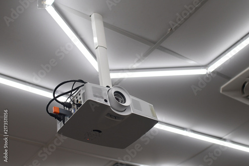 Obraz na płótnie Down view of ceiling mounted digital projector in modern office or conference room