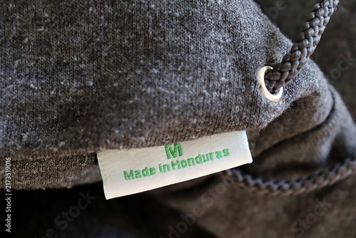 Fotografía Made in Honduras text and medium M size mark on fabric