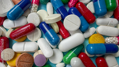 Obraz na plátně Full frame background of colorful bright medical pills capsules and tablets