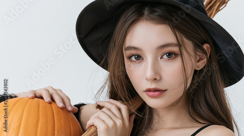 Halloween Witch with Pumpkin, Close Up Portrait with Copy Space